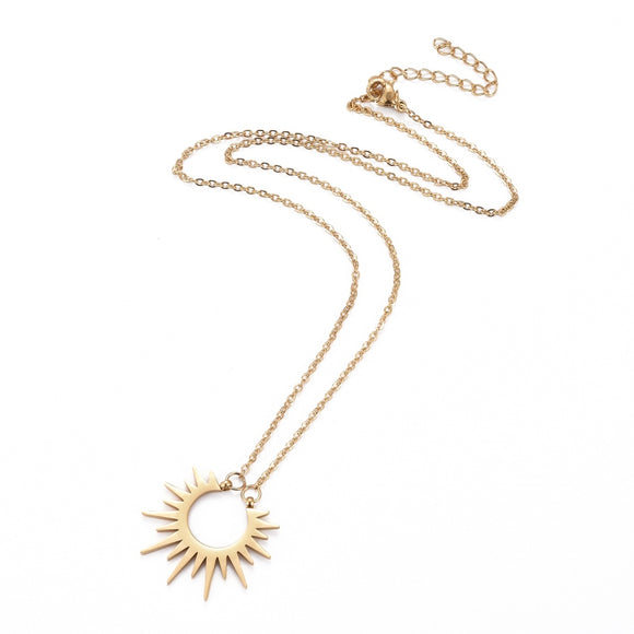 golden sun pendant necklace on cable chain with lobster claw clasp and extender on white background. 