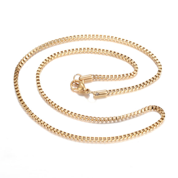 golden box chain necklace with lobster claw clasp on white background. 