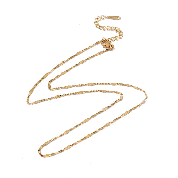 golden flat satellite curb chain with lobster claw clasp  and extender on  white background. 