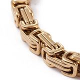 zoomed in section of Byzantine chain bracelet on white background. 