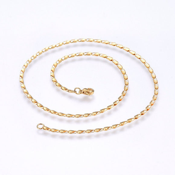 golden sheet chain necklace with lobster claw clasp on white background.